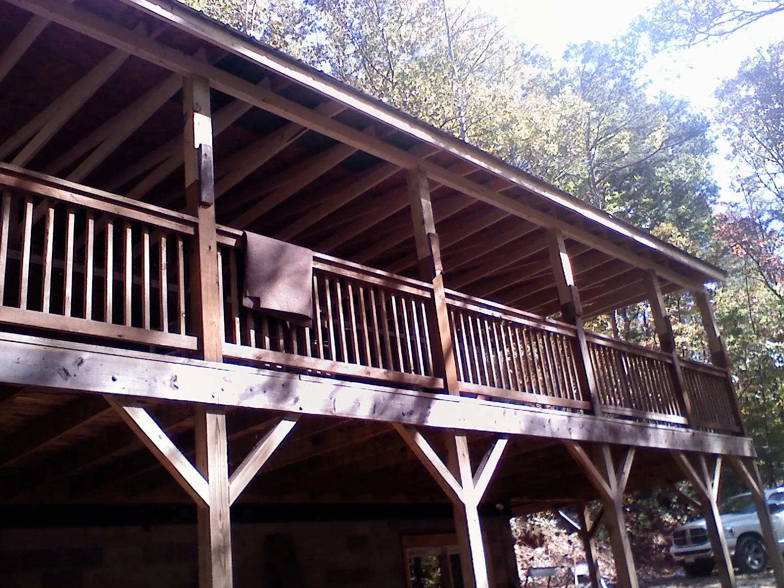 Timber framing under a new elevated porch and deck — Roof Leak Repair in Moss Point by Roofing Brothers